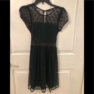 Green dress with polka dot lace top